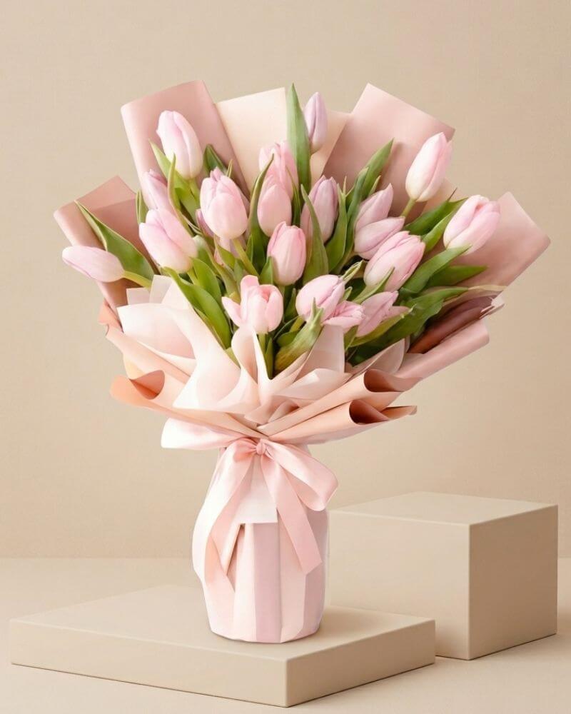 Elegant 20 Light Pink Tulip Bouquet wrapped in blush and ivory paper for luxury flower delivery in Dubai and UAE