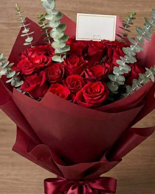 Luxury Pure Romance Bouquet with premium red roses and eucalyptus wrapped elegantly for romantic flower delivery in Dubai and UAE